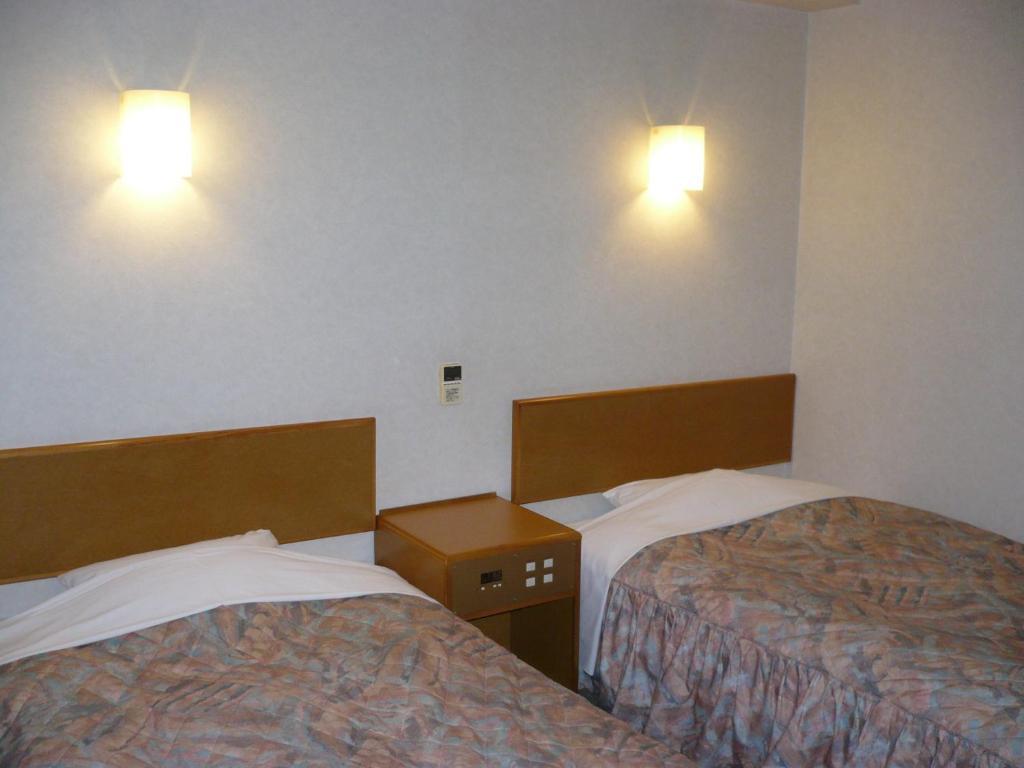 Hotel New Budget Muroran Quarto foto
